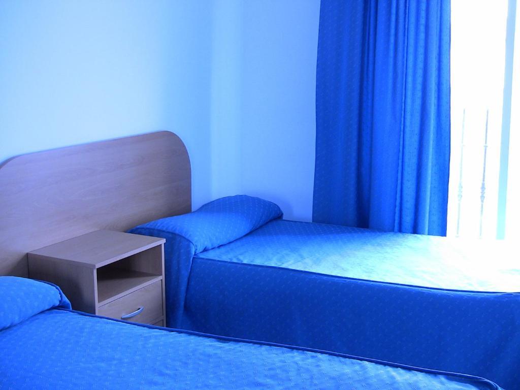 Apartahotel Los Hermanos Ocaña Pokoj fotografie