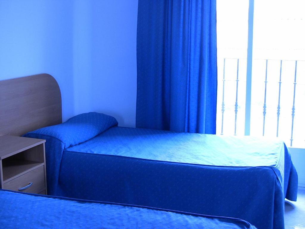 Apartahotel Los Hermanos Ocaña Pokoj fotografie