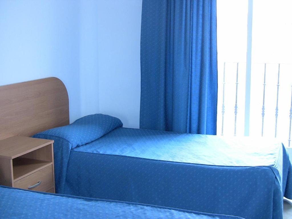 Apartahotel Los Hermanos Ocaña Pokoj fotografie